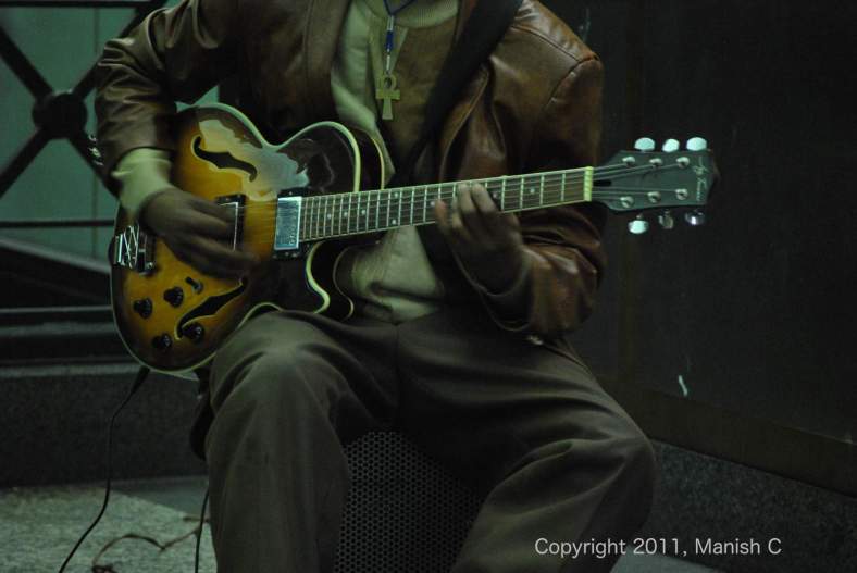 man with guitar-apr 2011-web